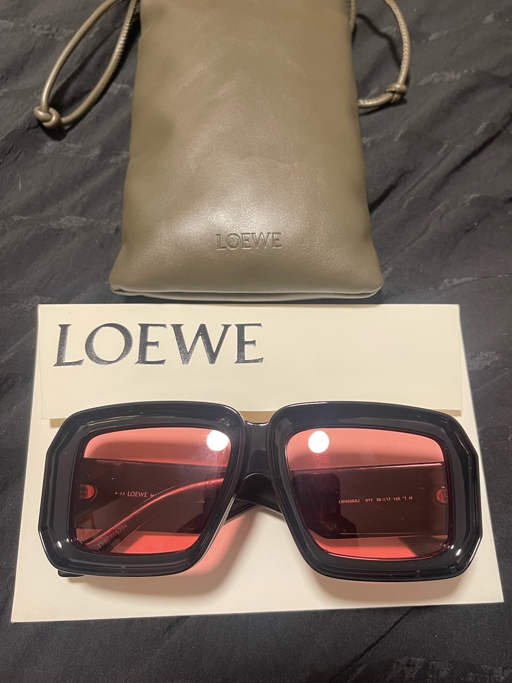 Loewe Black Frame Sunglasses with Rose-Pink Lenses